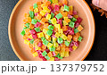 Candied fruit in colorful cubes as an ingredient for baked goods and sweets. Candied fruit 137379752