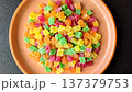 Candied fruit in colorful cubes as an ingredient for baked goods and sweets. Candied fruit 137379753