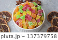 Candied fruit in colorful cubes as an ingredient for baked goods and sweets. Candied fruit 137379758