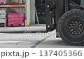 Forklift moving in warehouse logistics tracking shot industrial transport 137405366