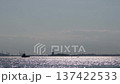 Sunlit Harbor With Peaceful Atmosphere, Serene Maritime Environment Showcases City Silhouette At 137422533