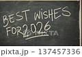 Chalkboard message displaying best wishes for the upcoming year 2026 with artistic flair 137457336