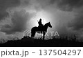 attila the hun on horse silhouette at dusk 137504297