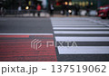 A video of people and cars passing by at the intersection in front of the Mitsukoshi Daimaru department store in Tenjin, Fukuoka City. It captures the natural flow of pedestrians and traffic during the day. 137519062