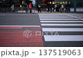 A video of people and cars passing by at the intersection in front of the Mitsukoshi Daimaru department store in Tenjin, Fukuoka City. It captures the natural flow of pedestrians and traffic during the day. 137519063