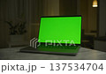 Laptop with Green Screen on Table 137534704