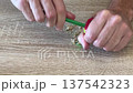 pencil sharpener scraping when sharpening a pencil 137542323