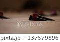 Instalation of ceramic tile on a floor. Floor leveling system. Closeup. 4K 137579896