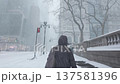 winter scene, heavy snowfall, New York city streets covered with snow. Houses, people and roads in winter. Blizzard, snowstorm and big snowflakes falling. Cold weather, poor visibility 137581396