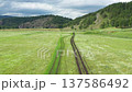 Camera moving forward above countryside road 137586492