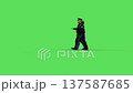 Policeman and policewoman walking. Realistic green screen isolate animation. 137587685