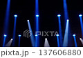 Blue moving lights illuminate stage with theatrical effects in slow motion, professional lighting setup for concerts shows nightclubs and audiovisual events 137606880