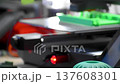 3d printer with some objects on the tray printed with pla filament 137608301