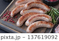 Grilled pork or chicken sausages, smoked fried food with salt and spices. Grilled sausages 137619092