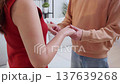 Close up of asian couple holding hands for encouragement and support. 137639268