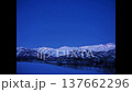 View of the Hakuba Sanzan mountains bathed in the glow of morning glow from near Tenjinzaka in Hakuba Village in the depths of winter 137662296