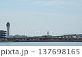 A 2000 series μ-SKY and a 2200 series Meitetsu train passing each other on the railway bridge connecting to Chubu Centrair International Airport (Meitetsu Airport Line, March 2026) 137698165