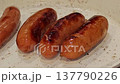 Juicy grilled sausage 137790226