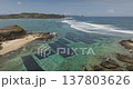 Aerial drone footage capturing the extensive seaweed farms submerged in the clear turquoise waters along the rugged coastline of Bukit Merese, Lombok, a vibrant aquafarming industry Aerial drone footage capturing the extensive seaweed farms submerged in the clear turquoise waters along the rugged coastline of Bukit Merese, Lombok, a vibrant aquafarming industry 137803626