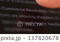 Finger scrolling text on computer screen macro with shallow depth of field. Dark theme 137820678
