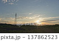 Cloud time lapse, transmission tower and sunset 137862523