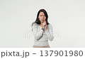 Young woman shivering and looking cold isolated on transparent background 137901980