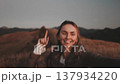 Happy woman dance jump enjoy freedom outdoor sunset autumn mountain landscape. Caucasian girl relax, travel, tourism, holiday, trekking, hiking, active lifestyle. Slow motion, close up portrait 137934220