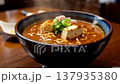 Delicious Steaming Bowl of Japanese Ramen Noodles with Tofu and Greens. 137935380