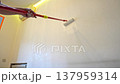 Person painting wall with roller timelapse 137959314