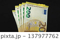 Euro banknotes, EUR. New green two hundred Euro banknotes. European Money. Cash, finance, savings, wealth. One thousand Euros in five 200 euro banknotes 137977762
