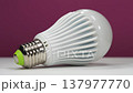 Large white LED lamp on a dark pink background 137977770