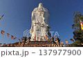 Standing Buddha statue against sky at Tong Lam Son Temple Nha Trang Vietnam 137977900