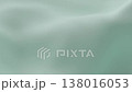 Soft mint green silk fabric gently rippling smooth waves creating elegant minimal background texture symbolizing freshness calm relaxation and luxury aesthetic ideal for design, video, or decor themes 138016053