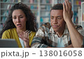 Unhappy ethnic students losing online bad result Indian Hispanic woman African American man classmates girl guy library university college laptop computer loss study frustration team upset technology 138016058