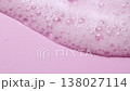 Slow motion close-up soap foam texture on pink background, white shampoo soapsud 138027114
