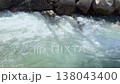 Clear clear emerald water in a mountain river. A sunny, warm day in Spain. Large stones on the shore to strengthen the riverbed. 138043400
