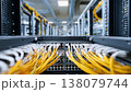 A Close-Up View of Structured Networking Equipment Highlighting Cable Management and Connectivity in a High-Tech Data Center Environment 138079744