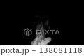 White isolated steam rises in graceful curves on a black background in slow motion. This steam trickle is perfect for overlay use with various blending modes, hot drink or food steam concepts. 138081118