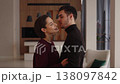 Couple shares a heartfelt moment in modern living room setting 138097842