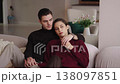Couple relaxing together in modern living room during cozy afternoon 138097851