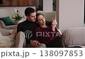 Couple enjoying a cozy moment together in a modern living room 138097853