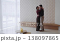 Couple dances intimately in minimalist modern interior space 138097865