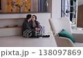 Couple enjoys quiet moment together in modern, stylish interior space 138097869