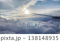 Airplane wing, view from window with beautiful sky and clouds 138148935