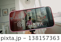 Teen With Pink Phone Case. Caucasian Teenager Using Mobile Phone With Pink Cover In Natural Light 138157363