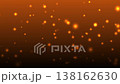 Animation Bokeh Numerous golden particles of light float across a warm, dark orange  138162630
