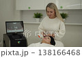 Ufa, Russia - 27 January 2026. Esthetician performing non invasive smas lifting photorejuvenation procedure on client neck, modern hardware cosmetology treatment for skin rejuvenation and facelift. 138166468