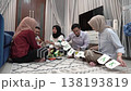 Relaxed family gathering with gifts and laughter tonight 138193819