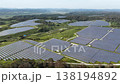 Drone aerial footage showing a large-scale mega solar power plant in Hokkaido, moving horizontally. 138194892