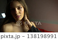 Face of Beautiful Brunette Woman Posing to Camera in Black Nightdress 138198991